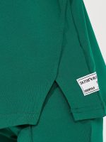 ⁦STYLI Girls Oversized Drop Shoulder T-Shirt & Flared Leggings Set⁩ - الصورة ⁦3⁩