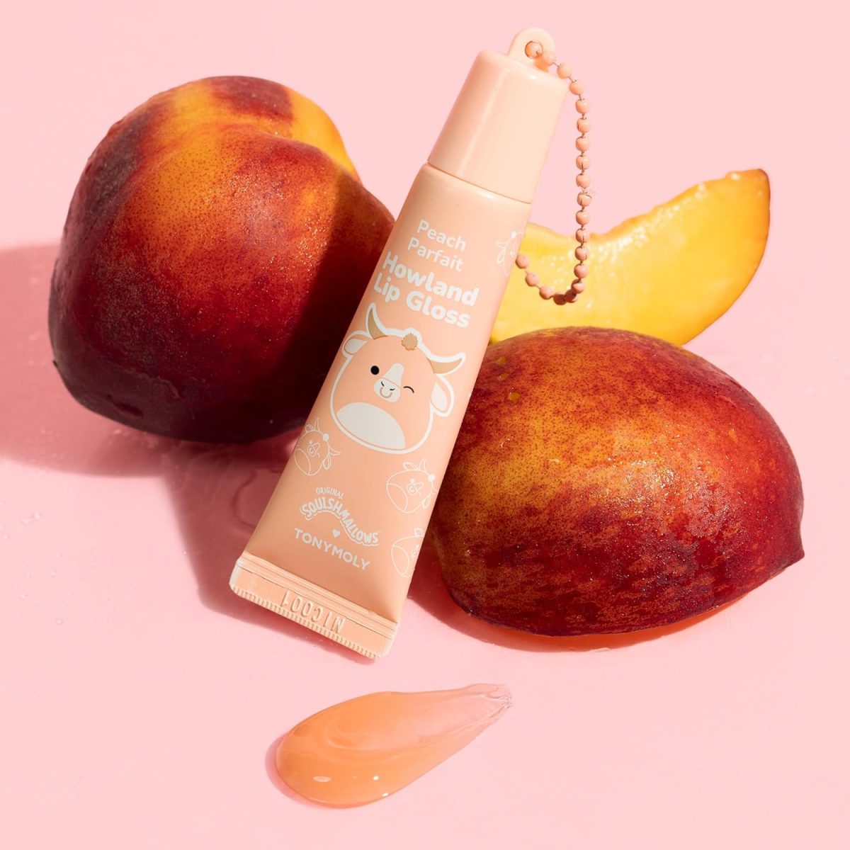 ⁦TONYMOLY x Squishmallows Howland Keychain Lip Gloss – Sheer Peach Tint, Hydrating & High-Shine Lip Balm with Peach Extract & Jojoba Oil, 11ml⁩ - الصورة ⁦7⁩