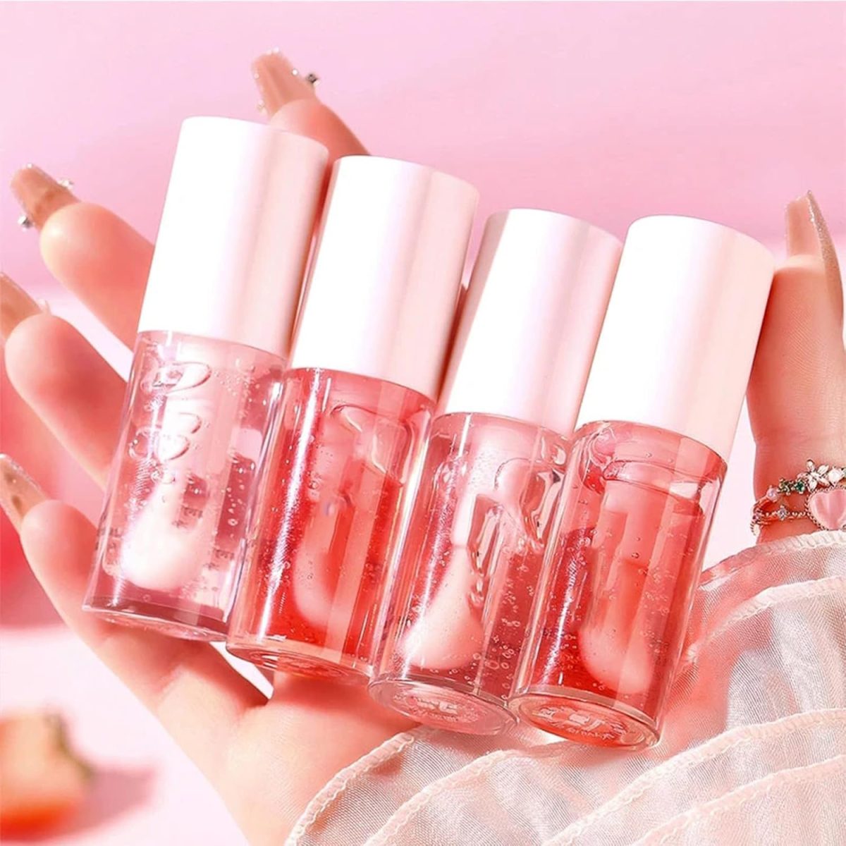 ⁦Khazna Fruity Flavors Lip Glosses, Long Lasting Moisturizing Lip Glow Transparent Lip Oil Strawberry and Peach Flavors Lip Care Lip Balm, 2Pcs⁩ - الصورة ⁦2⁩