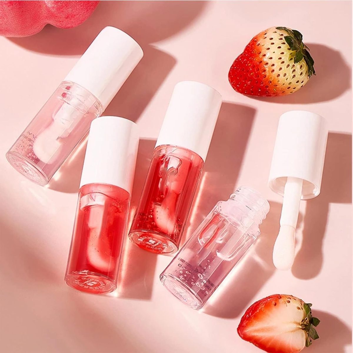 ⁦Khazna Fruity Flavors Lip Glosses, Long Lasting Moisturizing Lip Glow Transparent Lip Oil Strawberry and Peach Flavors Lip Care Lip Balm, 2Pcs⁩ - الصورة ⁦4⁩